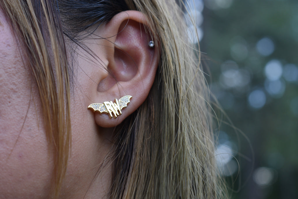 Roxy wrld Gold bat wing earrings