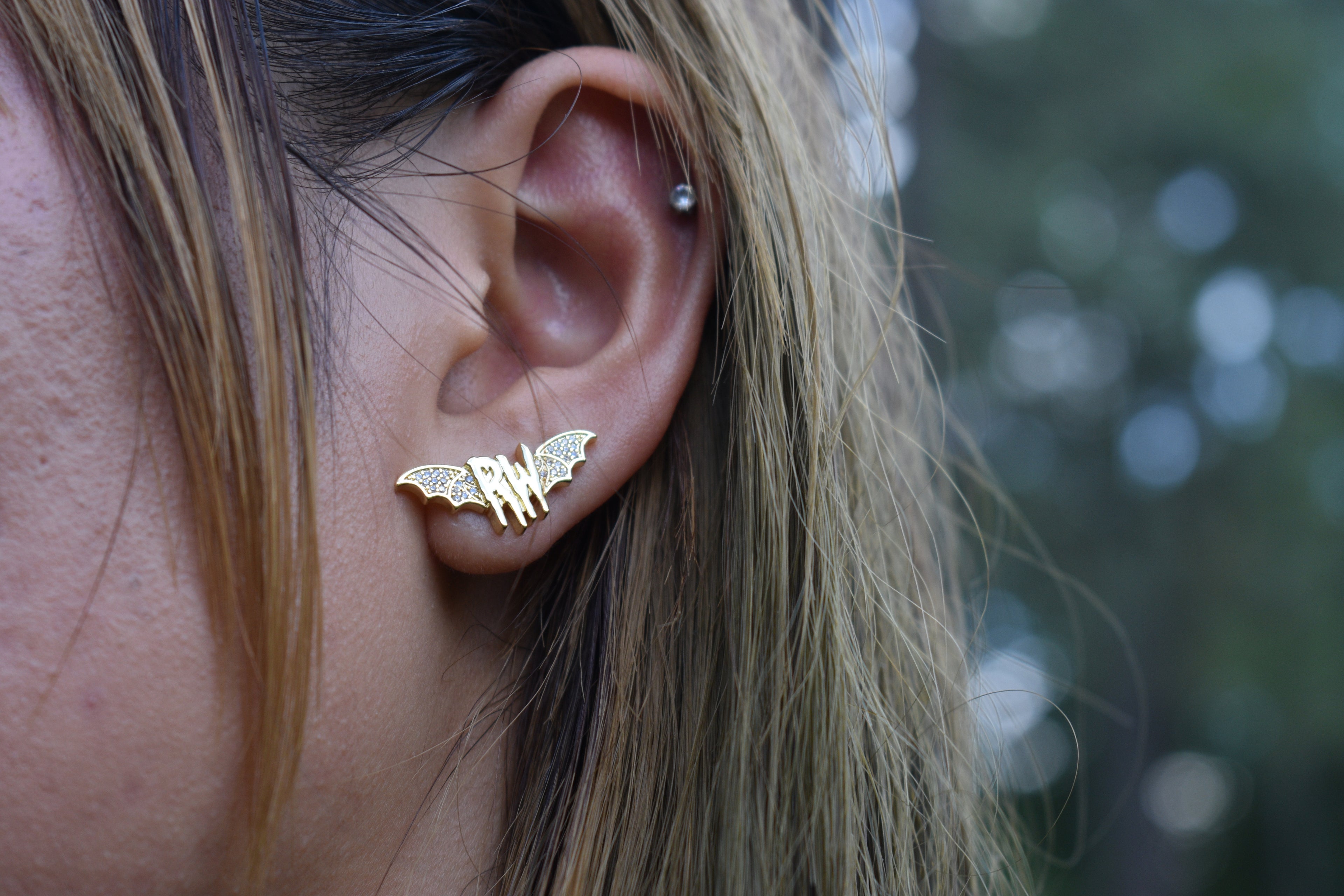 Roxy wrld Gold bat wing earrings