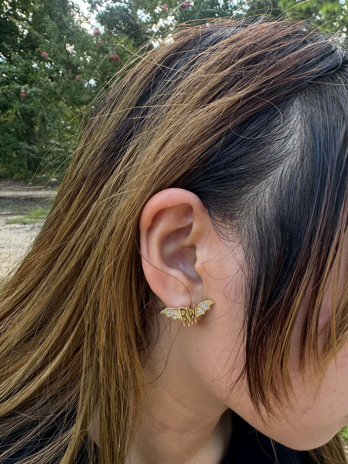 Roxy wrld Gold bat wing earrings