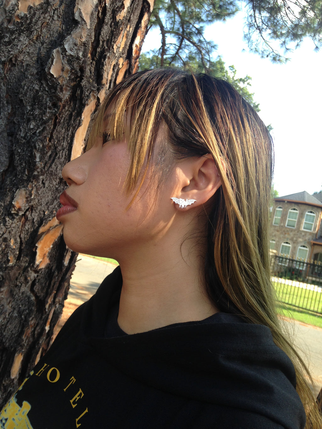 Roxy wrld silver bat wings earring