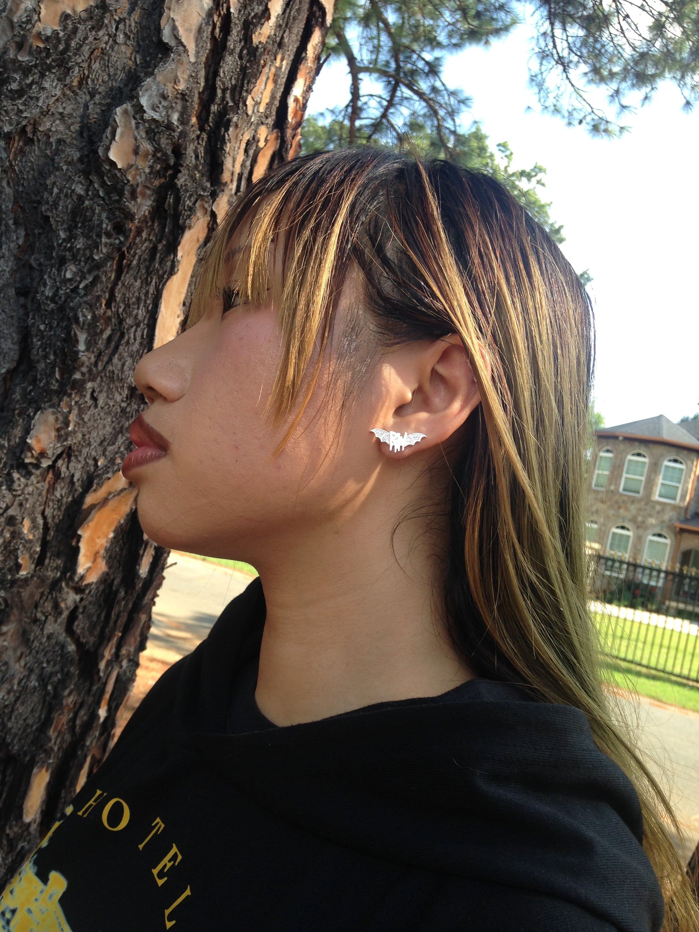 Roxy wrld silver bat wings earring